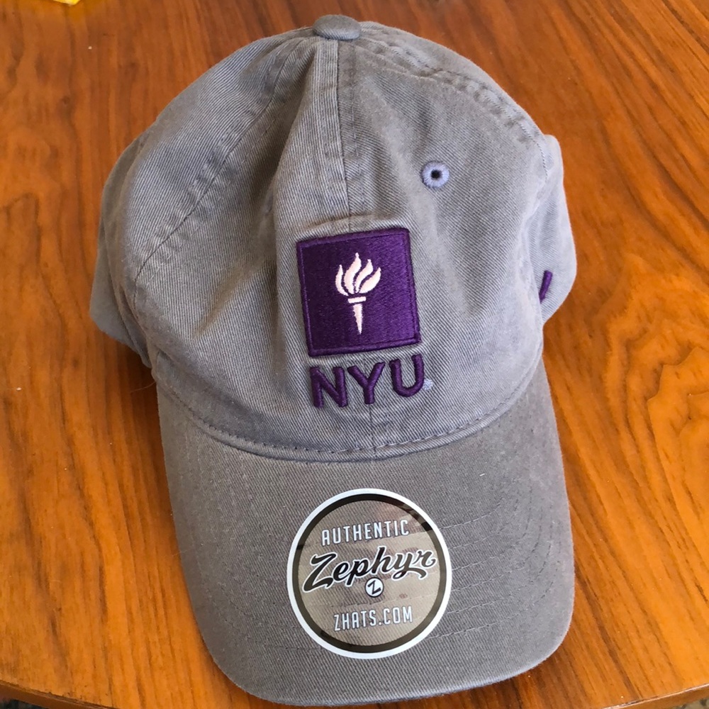 NYU baseball cap. Never worn. NWOT but still has stickers.
